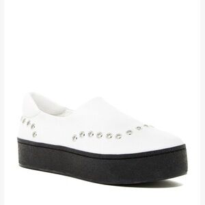 Opening Ceremony “CiCi Grommet” slip on sneakers